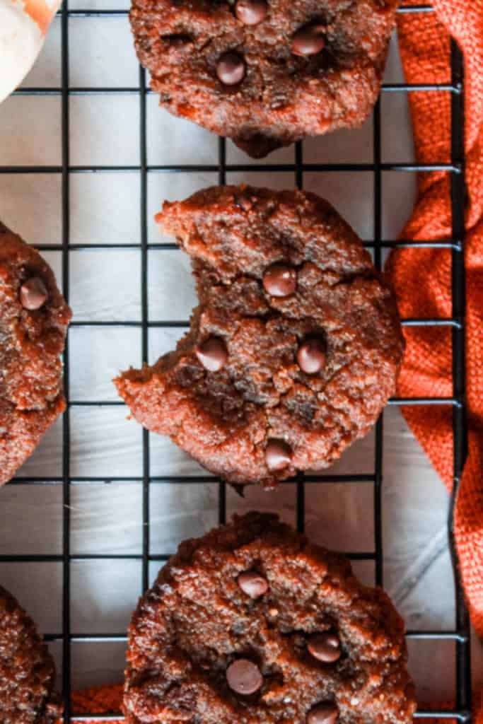 If you love pumpkin spice everything, you will love these gluten-free, oil-free, refined sugar-free cookies! They are tender, soft, and naturally sweet! #pumpkin #cookies #glutenfree